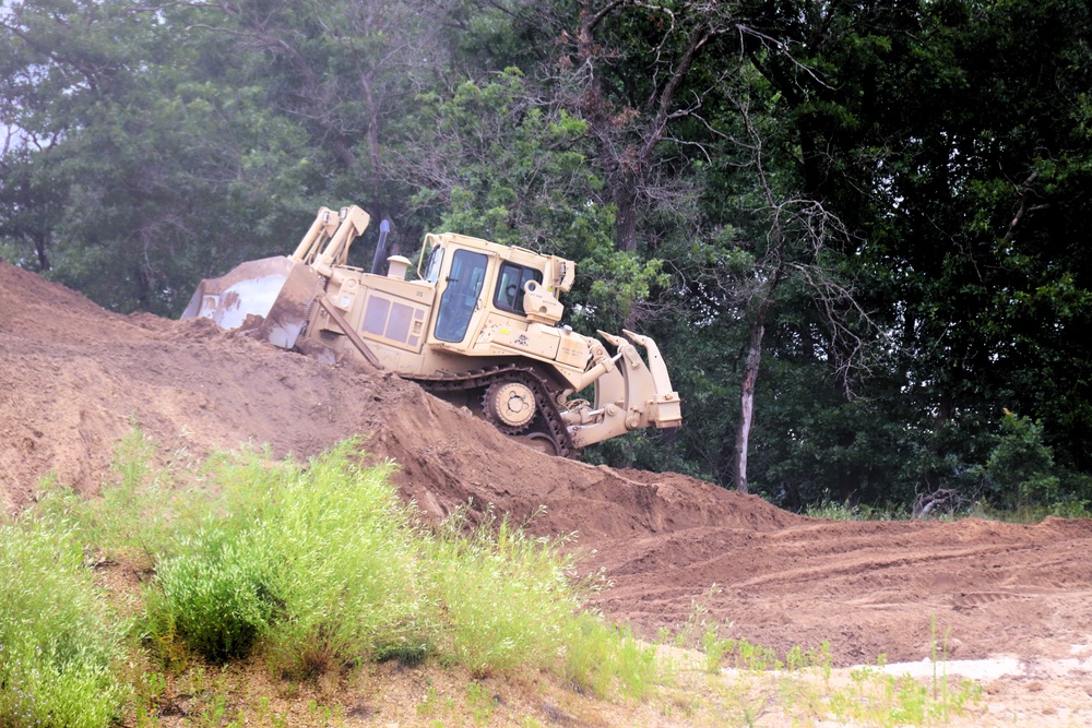 Engineer battalion Soldiers work on earth-moving troop project at Fort McCoy during July 2025 training