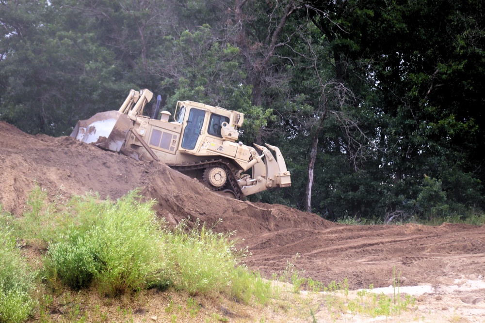 Engineer battalion Soldiers work on earth-moving troop project at Fort McCoy during July 2025 training