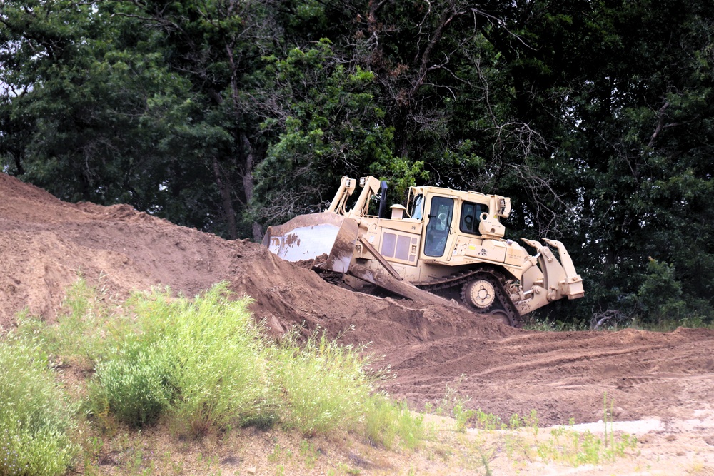 Engineer battalion Soldiers work on earth-moving troop project at Fort McCoy during July 2025 training