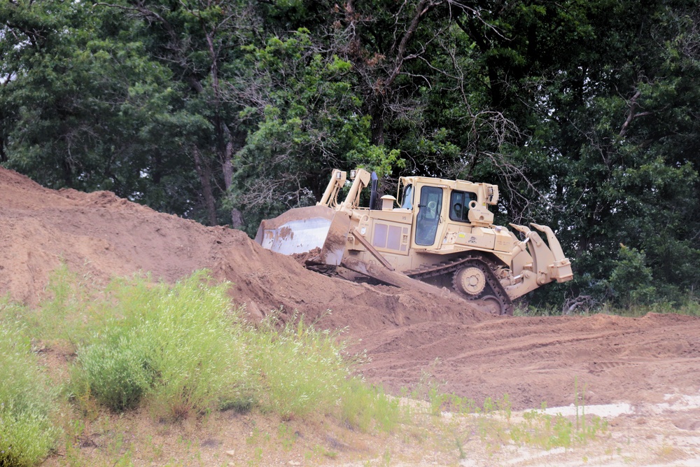 Engineer battalion Soldiers work on earth-moving troop project at Fort McCoy during July 2025 training