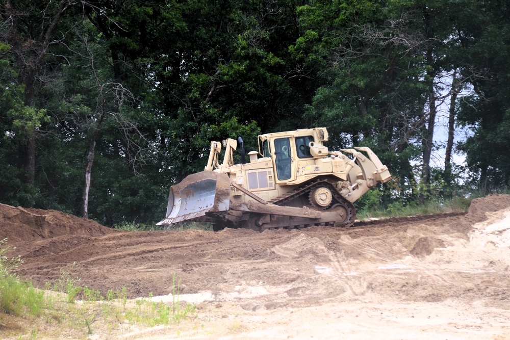 Engineer battalion Soldiers work on earth-moving troop project at Fort McCoy during July 2025 training