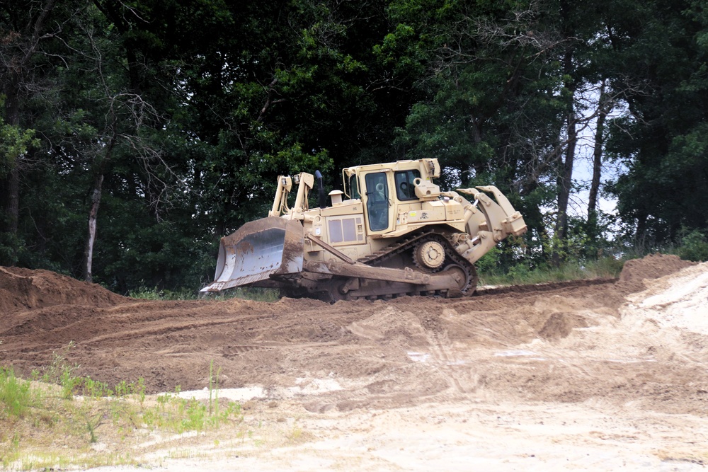 Engineer battalion Soldiers work on earth-moving troop project at Fort McCoy during July 2025 training