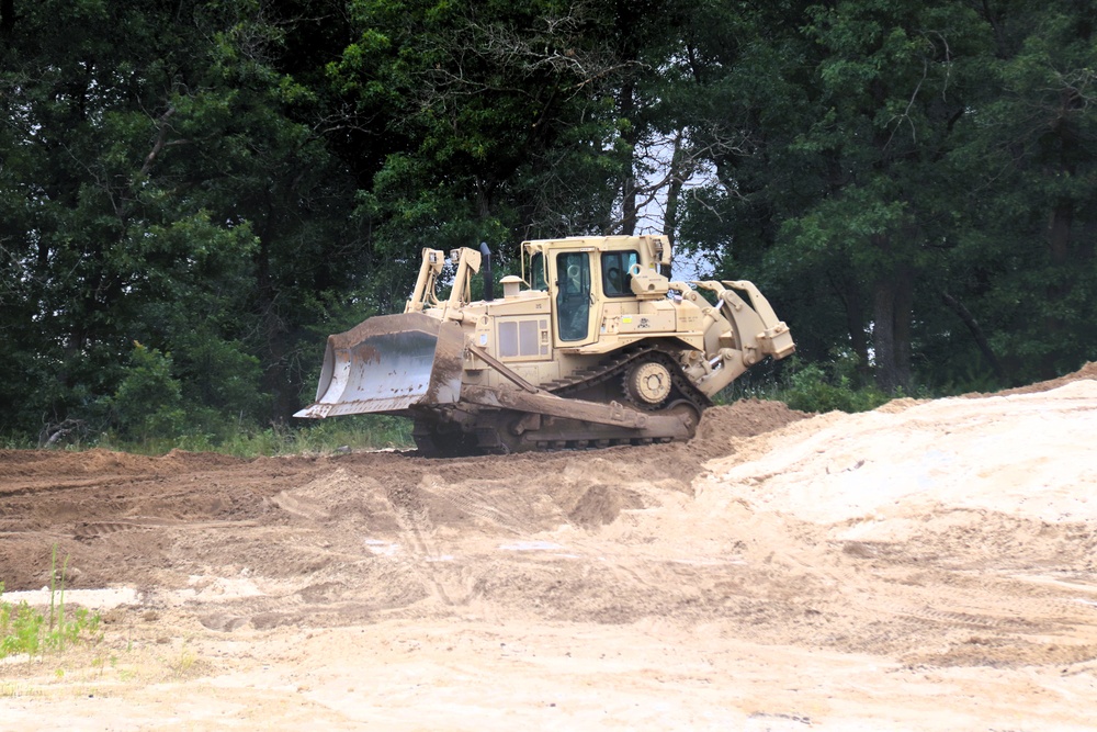 Engineer battalion Soldiers work on earth-moving troop project at Fort McCoy during July 2025 training