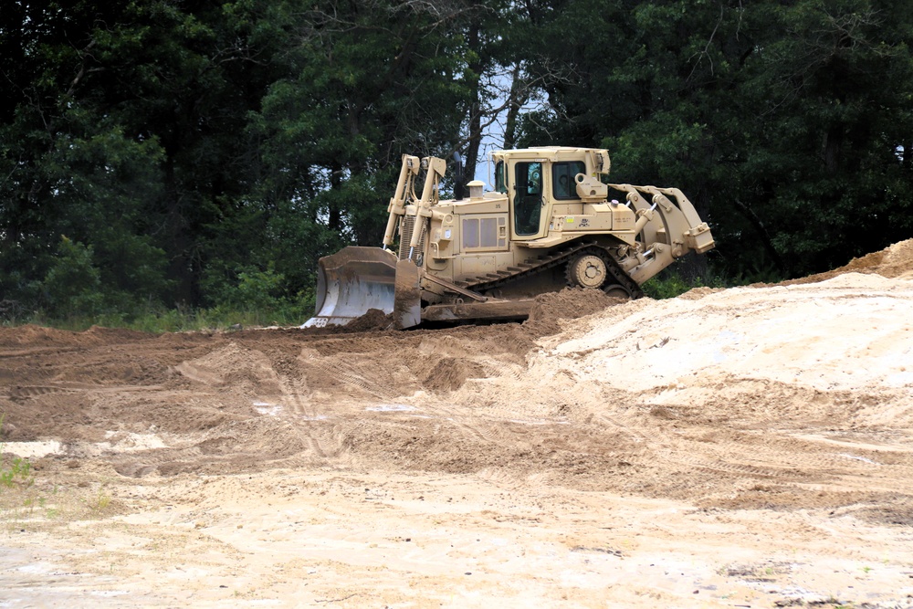Engineer battalion Soldiers work on earth-moving troop project at Fort McCoy during July 2025 training