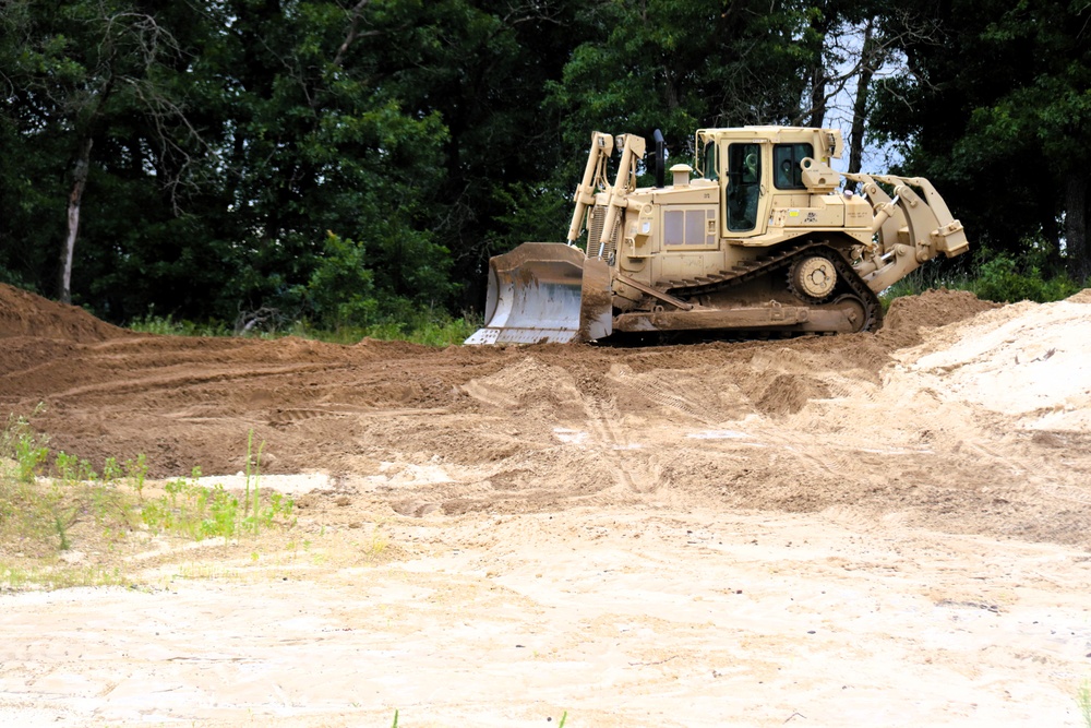 Engineer battalion Soldiers work on earth-moving troop project at Fort McCoy during July 2025 training