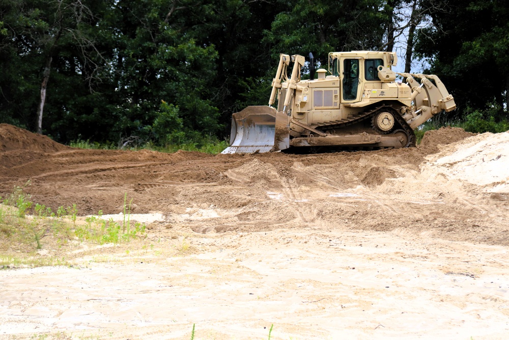 Engineer battalion Soldiers work on earth-moving troop project at Fort McCoy during July 2025 training