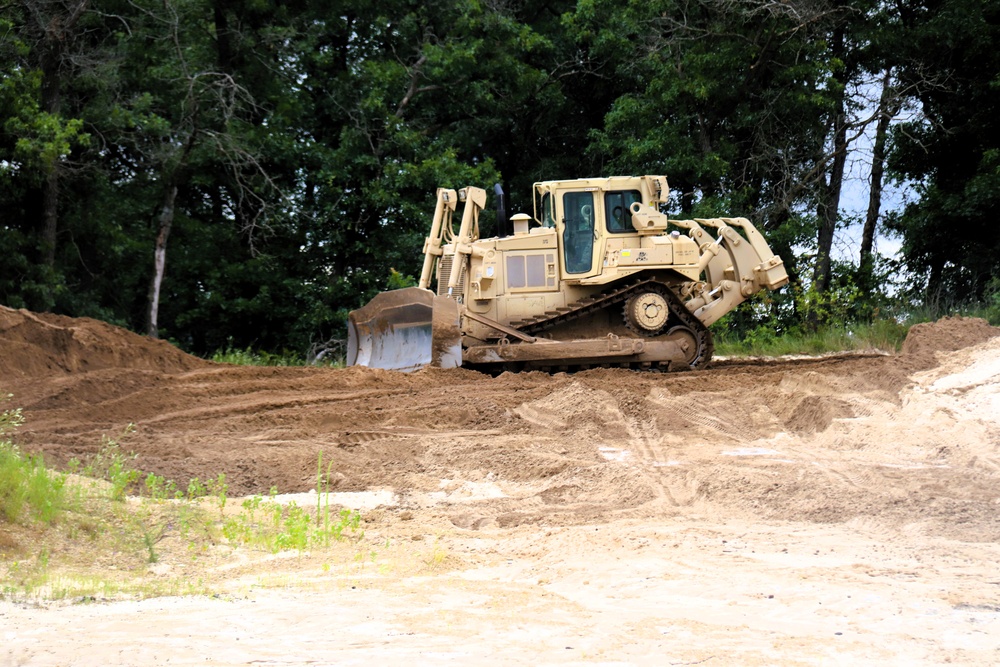 Engineer battalion Soldiers work on earth-moving troop project at Fort McCoy during July 2025 training