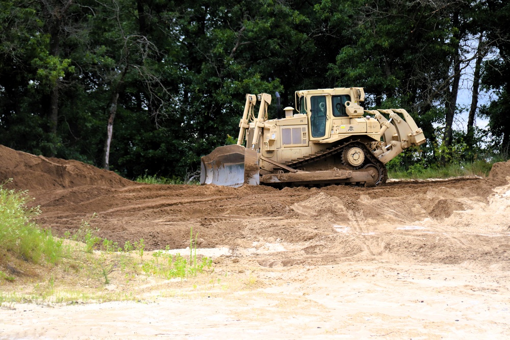 Engineer battalion Soldiers work on earth-moving troop project at Fort McCoy during July 2025 training