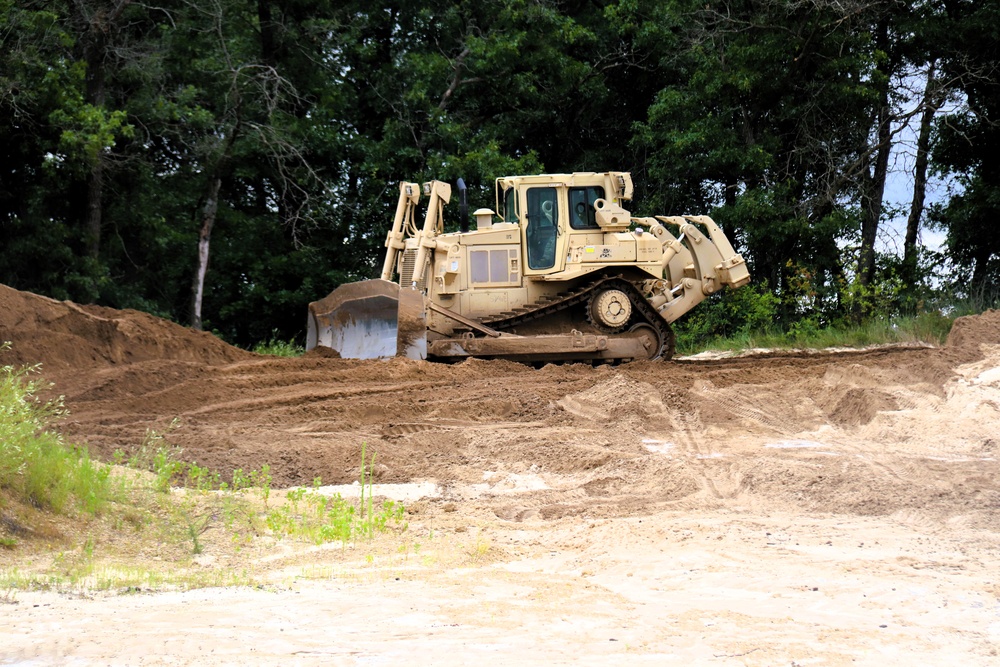 Engineer battalion Soldiers work on earth-moving troop project at Fort McCoy during July 2025 training