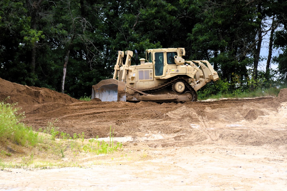 Engineer battalion Soldiers work on earth-moving troop project at Fort McCoy during July 2025 training