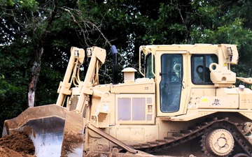 Iowa-based engineer battalion Soldiers work on earth-moving troop project at Fort McCoy during July 2025 training