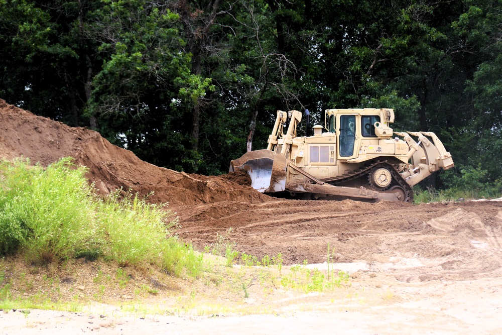Engineer battalion Soldiers work on earth-moving troop project at Fort McCoy during July 2025 training