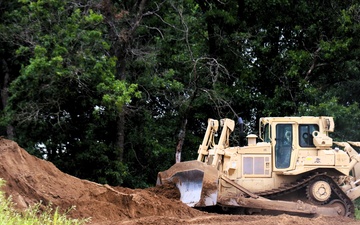Engineer battalion Soldiers work on earth-moving troop project at Fort McCoy during July 2025 training