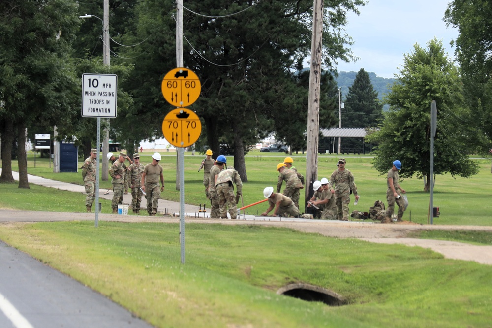 372nd Engineer Company Soldiers contribute to sidewalk troop project at Fort McCoy