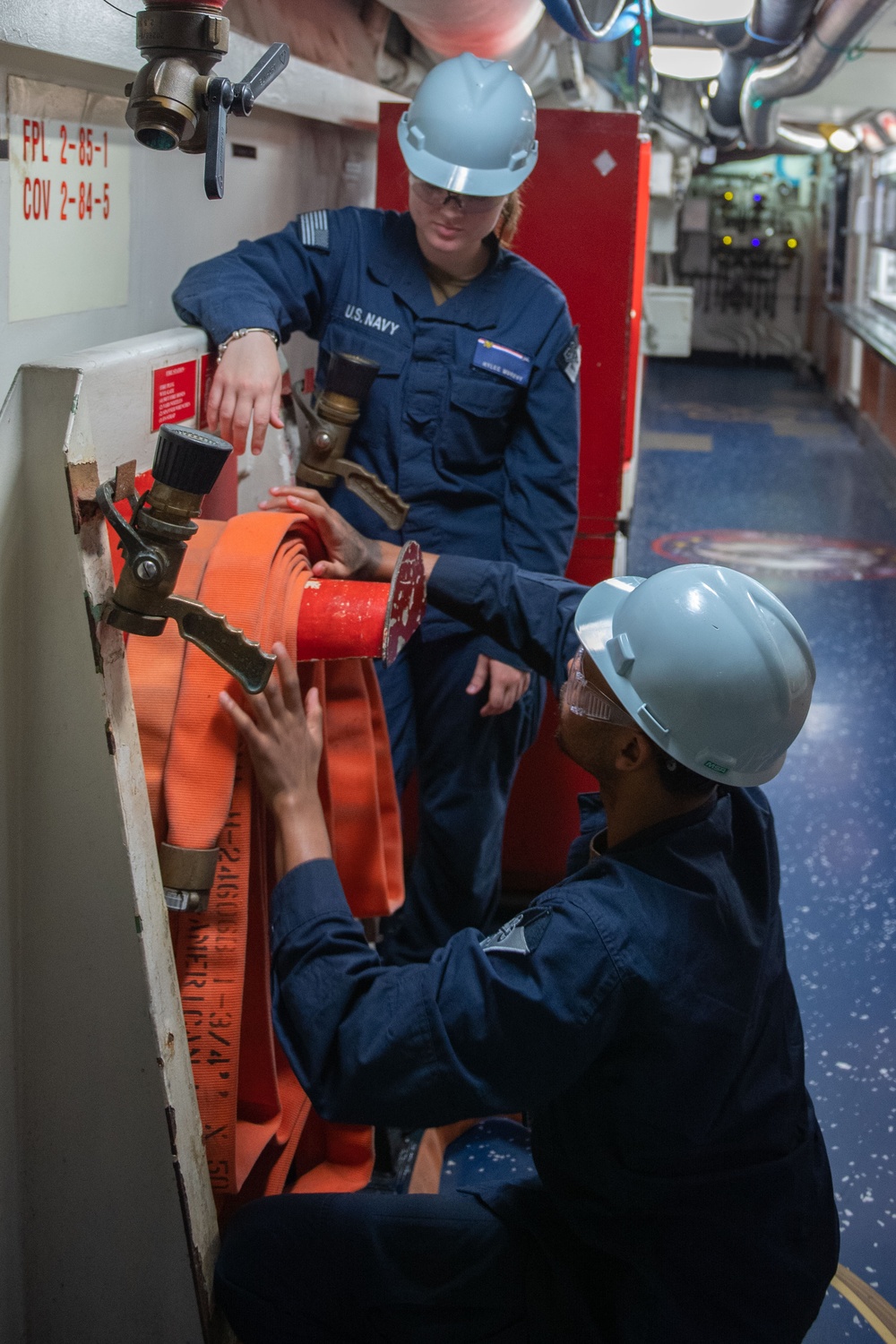 Ronald Reagan Sailors and Contractors Perform Maintenance
