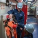 Ronald Reagan Sailors and Contractors Perform Maintenance