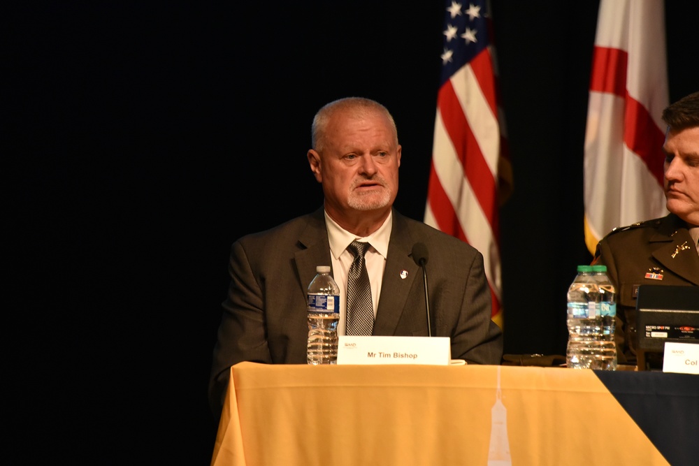 SMD COE Director Tim Bishop speaks at the Space and Missile Defense Acquisition Update Panel during the 2025 SMD Symposium