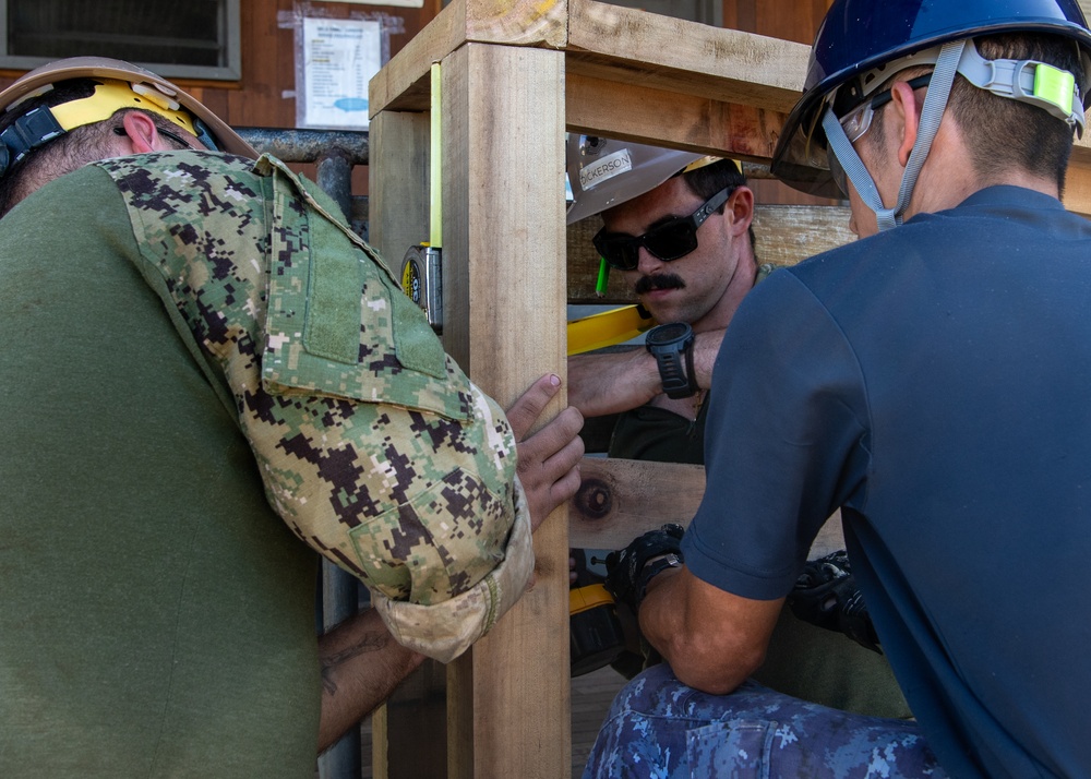 Pacific Partnership 2025 multinational service members construct a ramp in Lae, Papua New Guinea, August 2025
