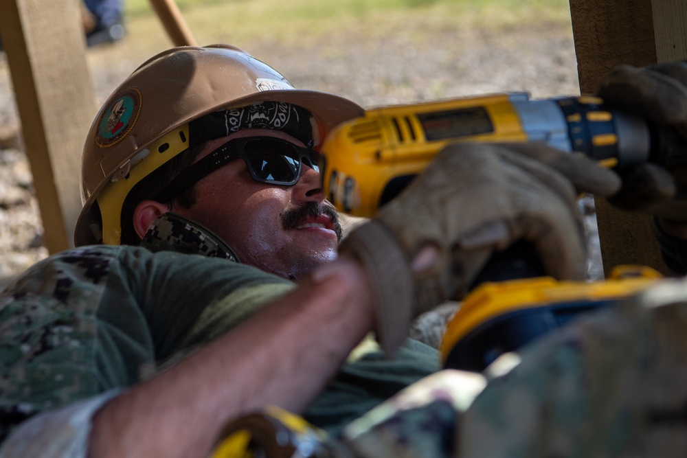 Pacific Partnership 2025 multinational service members construct a ramp in Lae, Papua New Guinea, August 2025