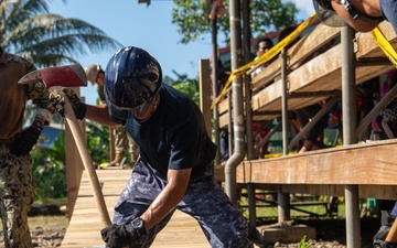 Pacific Partnership 2025 multinational service members construct a ramp in Lae, Papua New Guinea, August 2025