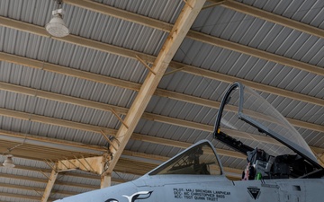 Col. Brian Leiter and Col. Rick Mitchell stand beside an A-10 Thunderbolt II