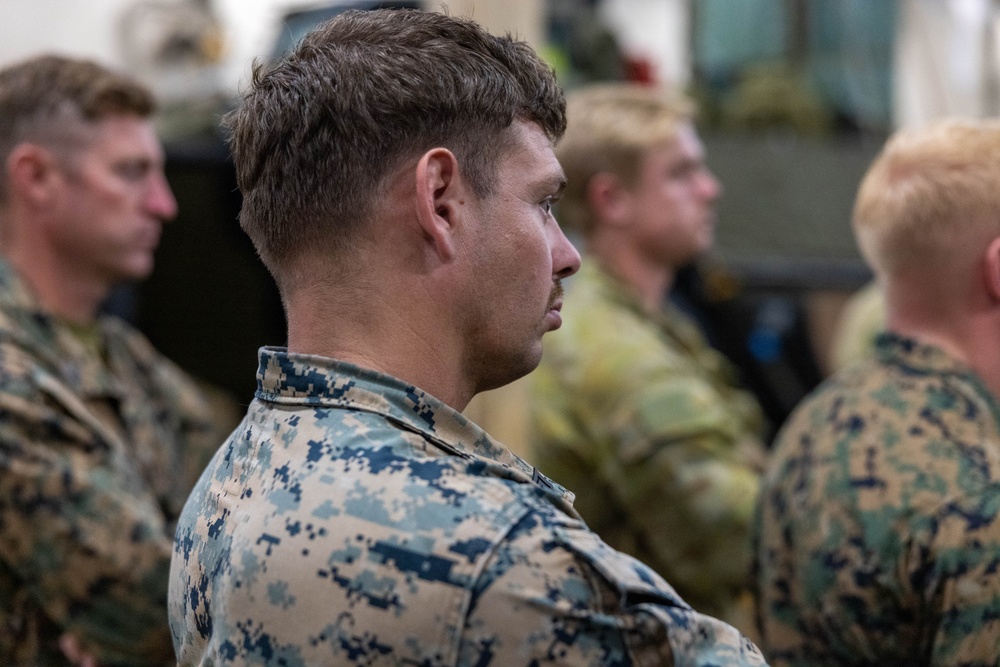 U.S. Marines with 1st Recon Bn., partner forces attend operations order brief