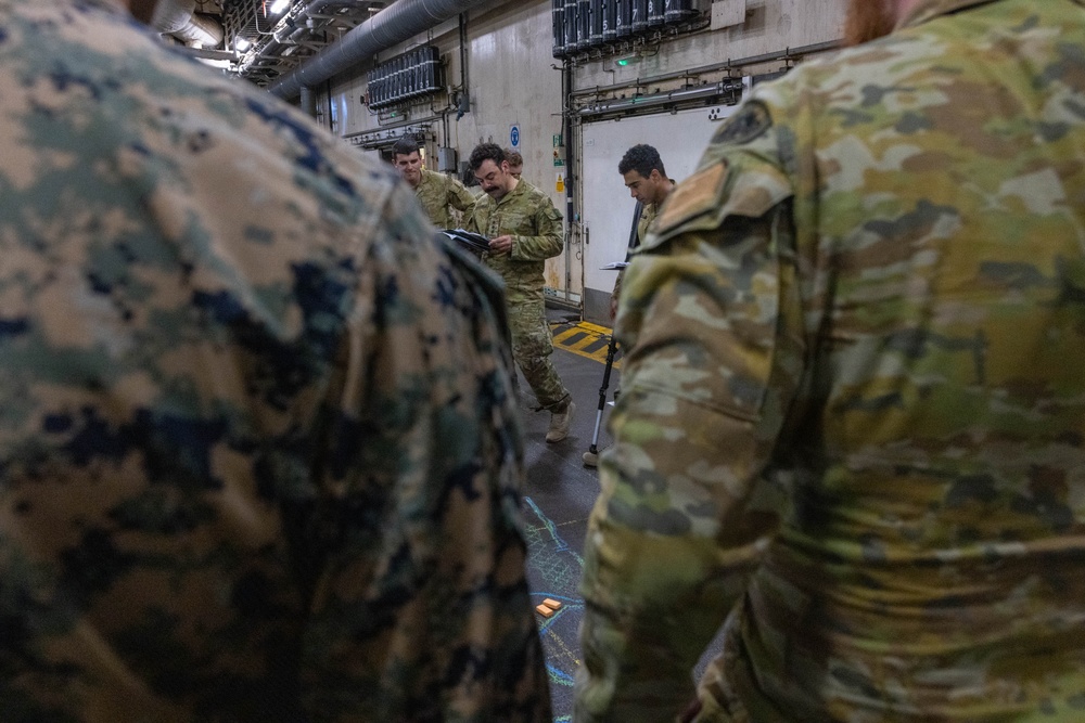 U.S. Marines with 1st Recon Bn., partner forces attend operations order brief