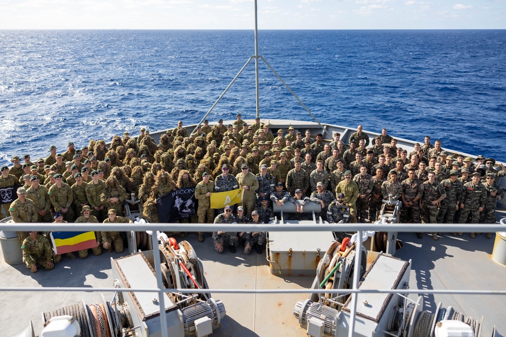 U.S. Marines with 1st Recon Bn., partner forces pose for group photograph aboard HMAS Choules