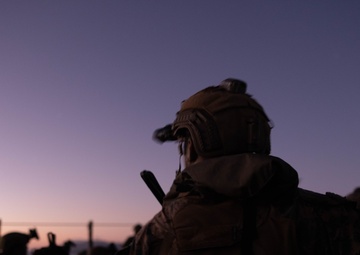 U.S. Marines with 1st Recon Bn., Australian Army soldiers prepare for nighttime small boat insertion