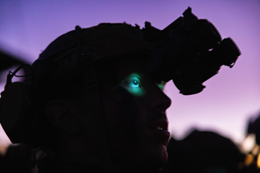 U.S. Marines with 1st Recon Bn., Australian Army soldiers prepare for nighttime small boat insertion