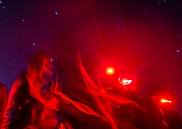 U.S. Marines with 1st Recon Bn., Australian Army soldiers prepare for nighttime small boat insertion