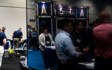 Operational Medical Systems team wraps exhibit during medical symposium day three