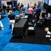 Operational Medical Systems team wraps exhibit during medical symposium day three