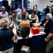 Operational Medical Systems team wraps exhibit during medical symposium day three