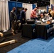 Operational Medical Systems team wraps exhibit during medical symposium day three
