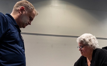 Operational Medical Systems team wraps exhibit during medical symposium day three