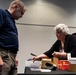 Operational Medical Systems team wraps exhibit during medical symposium day three