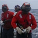 Sailors aboard the USS John Finn conduct a crash and salvage drill in the Indian Ocean
