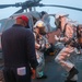 Sailors aboard the USS John Finn conduct a crash and salvage drill in the Indian Ocean