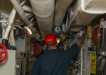 Sailors aboard the USS John Finn conduct a general quarters drill in the Andaman Sea