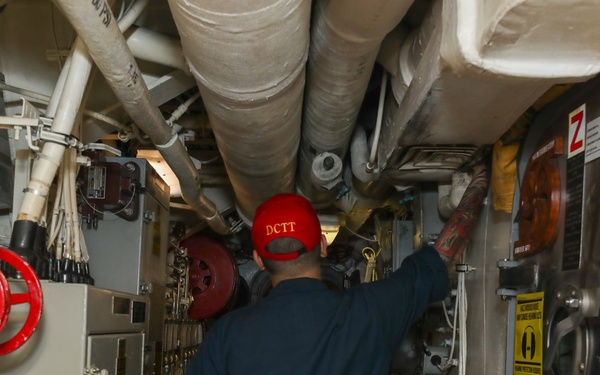 Sailors aboard the USS John Finn conduct a general quarters drill in the Andaman Sea