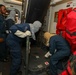 Sailors aboard the USS John Finn conduct a general quarters drill in the Andaman Sea