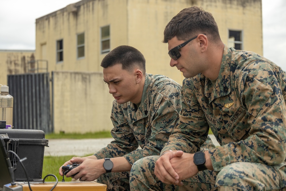 Marines with Advanced Infantry Training Battalion utilize a Vidterra Compass to Assess Students