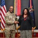 Gen. Gary Brito recognizes Shanda Misse-Ndong for receiving the DoD Spirit of Hope Award