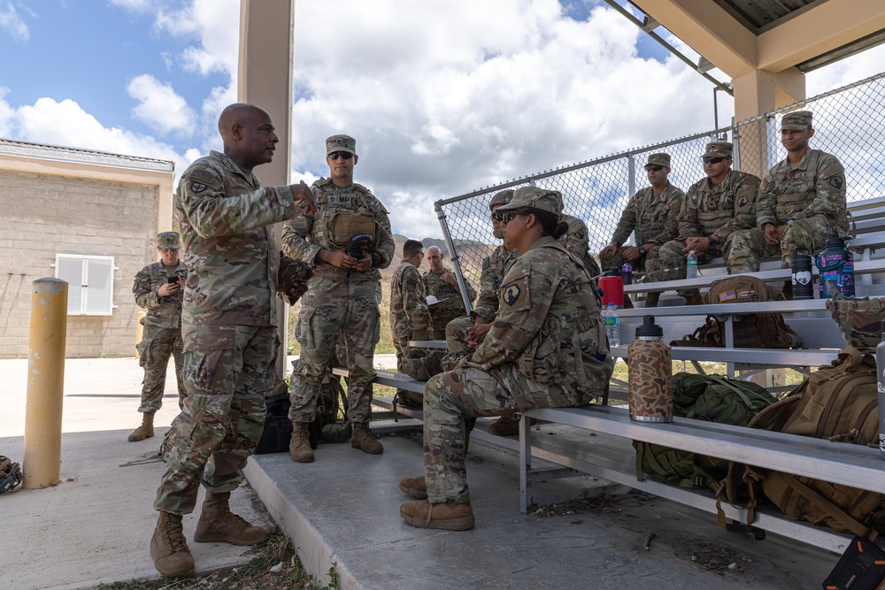 Command Sgt. Maj. Gregory Betty interacts with Soldiers