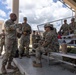 Command Sgt. Maj. Gregory Betty interacts with Soldiers