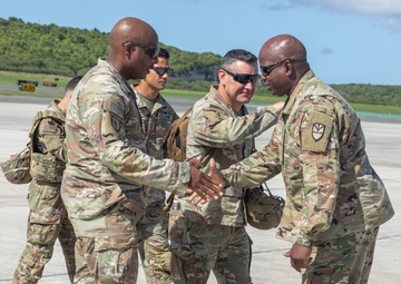 Command Sgt. Maj. Kent S. Bellot greets Command Sgt. Maj. Major Gregory Betty