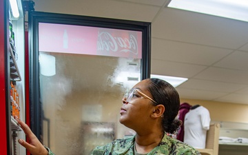 Ronald Reagan Sailors operate the ship’s store