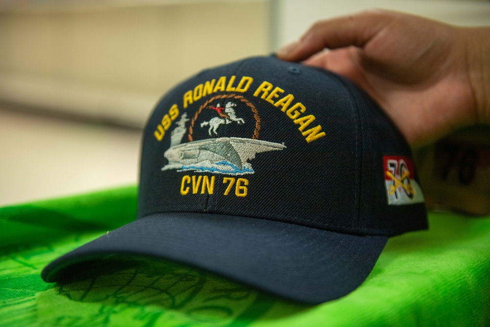 Ronald Reagan Sailors operate the ship’s store