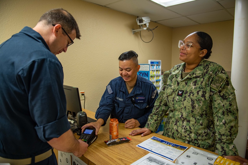 Ronald Reagan Sailors operate the ship’s store